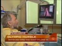 Swimmer Torres Motivates Coach