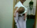 eden rose, being held by becky my learn n earn counselor. eden had colic, and becky showed me the way to hold eden's belly to help her out. lol! july 23 2008