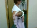 eden rose, being held by becky my learn n earn counselor. eden had colic, and becky showed me the way to hold eden's belly to help her out. lol! july 23 2008