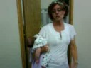 eden rose, being held by becky my learn n earn counselor. eden had colic, and becky showed me the way to hold eden's belly to help her out. lol! july 23 2008
