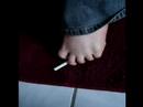 Dumb girl smokes with her toes.