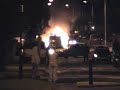 Police Car Fire, ground burning in front of vehicle Police Car Fire, ground burning in front of vehicle