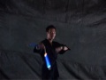 演出:唱作者JAY中国已故伟大武术家李小龙先生世界各地的高手们Background MusicSong 歌: Nunchakus 双节棍lyrics 詞：Vincent 方文山  曲：Jay 周杰倫 岩燒店的煙味瀰漫 隔壁是國術館 店裡面的媽媽桑 茶道 有三段 教拳腳武術的老闆 練鐵沙掌 耍楊家槍 硬底子功夫最擅長 還會金鐘罩鐵步衫 他們兒子我習慣 從小就耳濡目染 什麼刀槍跟棍棒 我都耍的有模有樣 什麼兵器最喜歡 雙截棍柔中帶剛 想要去河南嵩山 學少林跟武當 幹什麼(客) 幹什麼(客) 呼吸吐納心自在 幹什麼(客) 幹什麼(客) 氣沉丹田手心開 幹什麼(客) 幹什麼(客) 日行千里繫沙袋 飛簷走壁莫奇怪 去去就來 一個馬步向前 一記左鉤拳 右鉤拳 一句惹毛我的人有危險 一再重演 一根我不抽的菸 一放好多年 它一直在身邊 幹什麼(客) 幹什麼(客) 我打開任督二脈 幹什麼(客) 幹什麼(客) 東亞病夫的招牌 幹什麼(客) 幹什麼(客) 已被我一腳踢開 快使用雙截棍 哼哼哈兮 快使用雙截棍 哼哼哈兮 習武之人切記 仁者無敵 是誰在練太極 風生水起 快使用雙截棍 哼哼哈兮 快使用雙截棍 哼哼哈兮 如果我有輕功 飛簷走壁 為人耿直不屈 一身正氣 快使用雙截棍 哼 我用手刀防禦 哼 漂亮的迴旋踢