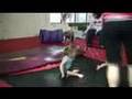 Giggling Girl Bounced on Trampoline