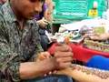 me getting henna - pahar ganj, delhi, india
