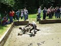 bro. stan gleason and bro. james dillon said they would mud wrestle if we would raise $1500 for sheaves for christ