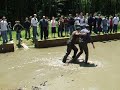 bro. stan gleason and bro. james dillon said they would mud wrestle if we would raise $1500 for sheaves for christ
