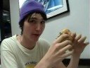 Bossow eats a dodeca-stacker from burger king. Thats 3 quad stackers. Thats over 3000 calories.