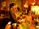 Jenny lights Menorah with MacMercks