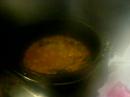 In the dutch oven, you can see gulasch simmered for dinner, while snow falling outside.