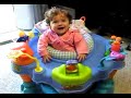 Kalena beating her toy with another toy
