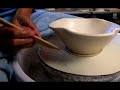 Learn how to trim the clay when you're makingclay pottery bowls with expert tips on throwing on pottery wheels in this free video art lesson. Expert: Lucy Fagella Contact: www.luciapottery.com Bio: Lucy Fagella, a gifted Massachusetts artisan creates unique and beautifully detailed hand made pottery. Lucy has been teaching pottery since 1986. Filmmaker: Christian Munoz-Donoso