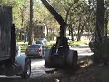 Hurrican Ike Trash  Removal Crane to Hauling Trucks