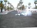 BMW Sauber F1 burning rubber in the centre of Barcelona