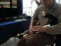 Tiarnan Duinnchinn playing an arhpa uilleann pipe