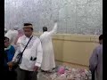 A brother stones the big Jamarat for himself and 2 other people on thier behalfs. Hajj 2007.
