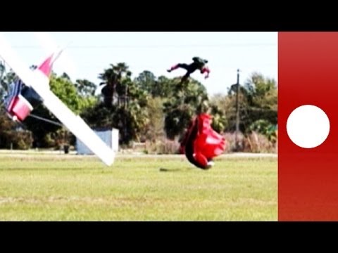 Plane hits landing skydiver during take-off, crashes into ground - pictures of collision