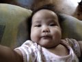 cassie tryin to thumbsuck at 3 months