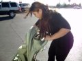 Christine tryin to open the stroller