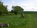 Tash and Rowan jumping the logs on the farm
