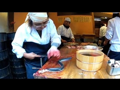 Preparing Live Eels for Lunch at Narita Temple near Tokyo Japan