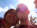 now it's sunny, and madhavi and jeremy cross the charles bridge in prague