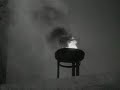 Excerpt from \"Olympia\" (1938) - torch into stadium