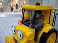 Trator de brinquedo.