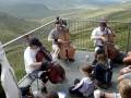 Extreme cellists halfway up Snowdon