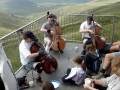 Extreme cellists halfway up Snowdon
