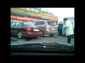 Video: Woman Walking & Talking On Cell Phone Walks Into Car