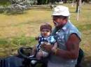 Mike Michaelson {oompa} and Sebastian riding a tractor pt.#1