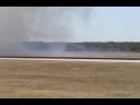 Joe Fagundes
SNJ Texan

2008 Blue Angels Homecoming
NAS Pensacola
Pensacola, Florida
Saturday November 15, 2008

IN THIS VIDEO, watch as Joe Fagundes flies his SNJ Texan over NAS Pensacola, in an attempt to race Jeremy Fields in the Super Shockwave Jet Truck.  Because of the winds, the Super Shockwave Jet Truck did not do a high speed run down Runway 25L, mainly in the interest of safety.  I apologize for the shakiness of the video.  Thursday and Friday had very little wind and it was very warm, while Saturday was very cold and very windy, and that is reflected in this video.

Like what you've seen? Well, if you are interested in purchasing DVDs of specific aircraft and/or of airshows, interested in anything and everything related to airshows (where the jet teams will show up, all airshow performers, airshow reports from airshows I have attended, previews of airshows I will be attending, etc.), a much more easier to navigate 