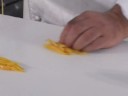 This video demonstrates how to peel, julienne and cook orange rind in simple syrup. Methods and techniques shown here also apply to limes, lemons and grapefruits, all of which have rinds that can be candied.