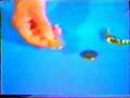 Fred Kaps performing a coin purse routine