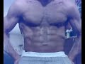 Shirtless strong muscled body flex