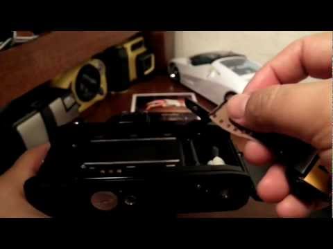 how to open a minolta x-370 camera