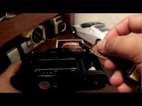 how to open a minolta x 700 camera