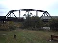 a csx manifest crosses the monongahela river via the pinkerton's landing bridge. also known as the munhall railroad bridge, it was built in the late 1800's for the pittsburgh and lake erie railroad. the former p&le trackage is now home to csx's pittsburgh subdivision.
i was too far away to read the numbers on the locos, but they all seem to be 7xxx, making them d8-40cw; the third unit is a standard cab d8-40.