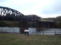 a csx manifest crosses the monongahela river via the pinkerton's landing bridge. also known as the munhall railroad bridge, it was built in the late 1800's for the pittsburgh and lake erie railroad. the former p&le trackage is now home to csx's pittsburgh subdivision.
i was too far away to read the numbers on the locos, but they all seem to be 7xxx, making them d8-40cw; the third unit is a standard cab d8-40.