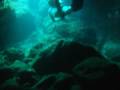 Diving through an underwater tunnel