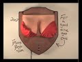 Watch Jingle Jugs the animatronic singing dancing boobs.
