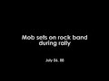Mob sets on rock band during rally