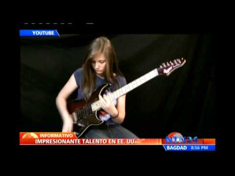 ERUPTION - Visite: http://www.ntn24.com - La joven conocida como Tina, interpreta con la guitarra eléctrica uno de los solos más complejos del género Rock,
