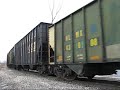 CSXT 415 leads a loaded Coke train west through Pine Junction - Gary, IN. 01/03/09