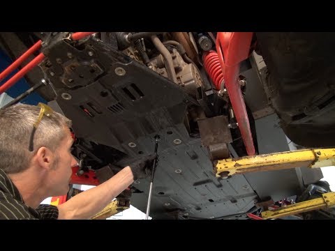 how to change oil in rzr xp