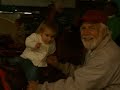 taylor riding a pony with granda bill at the state fair!