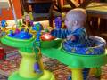 Liam playing with his activity center