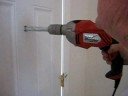 HOW TO DRILL A HOL IN YOUR FRONT DOOR.