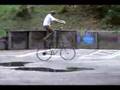 Guy rides giant bike!